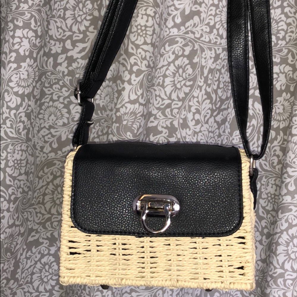Leather strapped basket bag with clasp